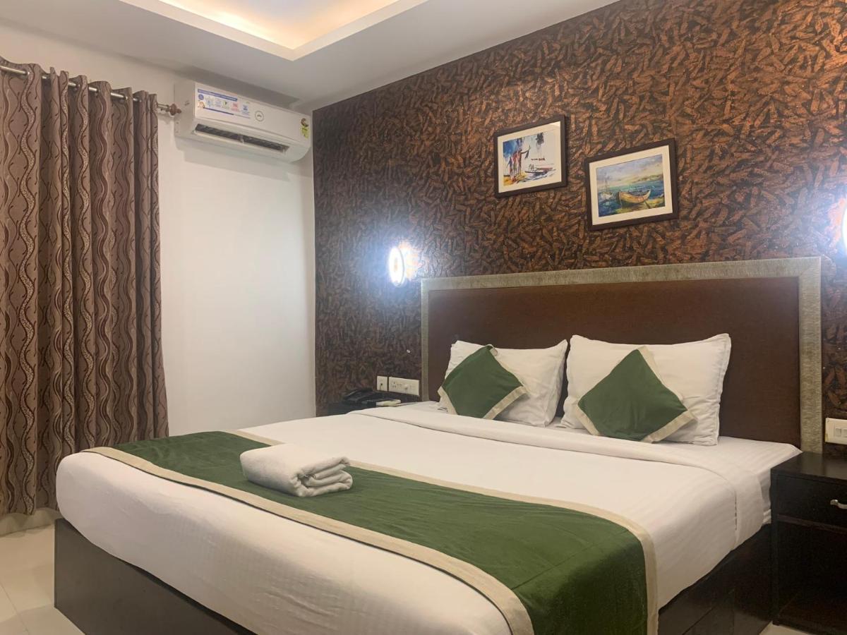 Hotel Greenlife Kochi Bagian luar foto